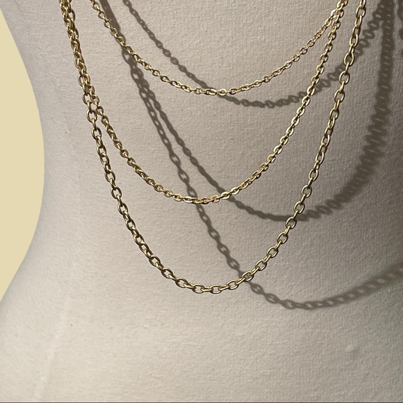 Ttahari Long Goldtone Strands Necklace with Black Accent - Picture 4 of 5